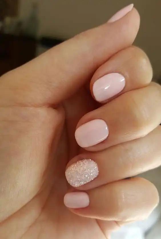 Blush Pink Nails with Glitter Accent