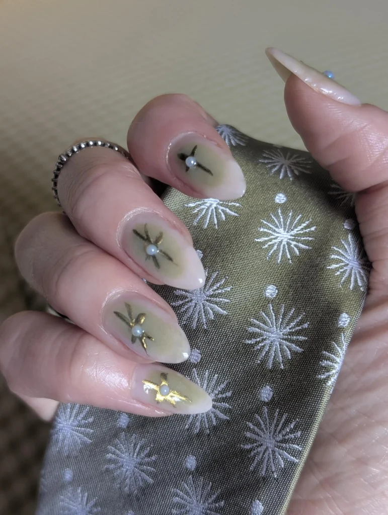 Golden Star Accent Nails with Pearl Details