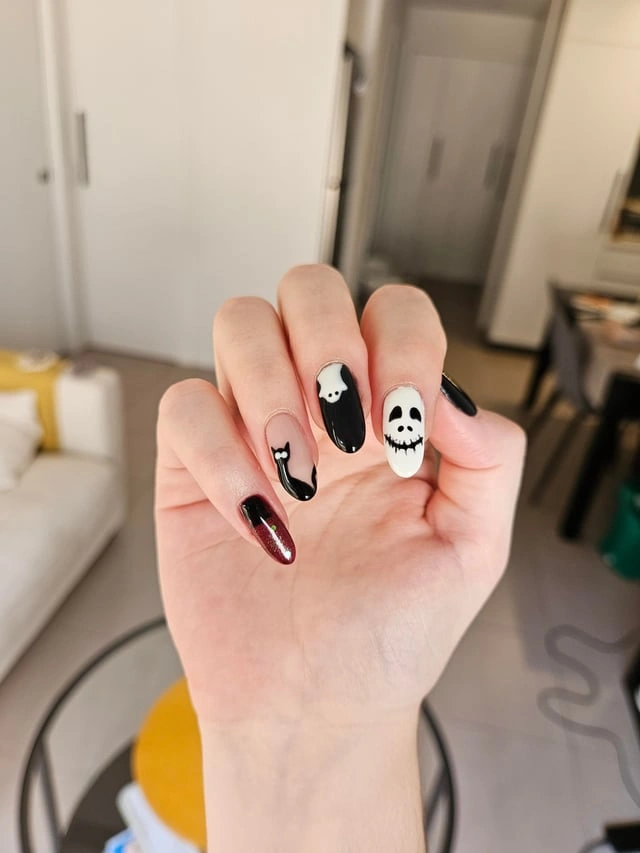 Glossy Black Mini Ghost Nails